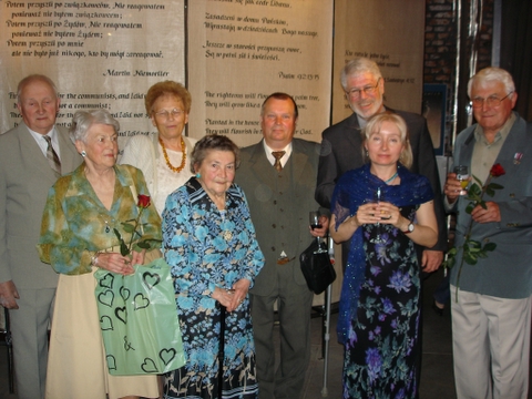 Dennis Misler and Eva Szymancuk pose with several of the Righteous.